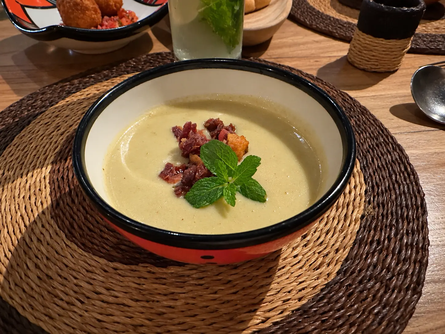 Roasted pumpkin soup with butter-fried sage, pumpkin seeds and sourdough served during Mexican night at Nuru, Four Seasons Safari Lodge Serengeti.