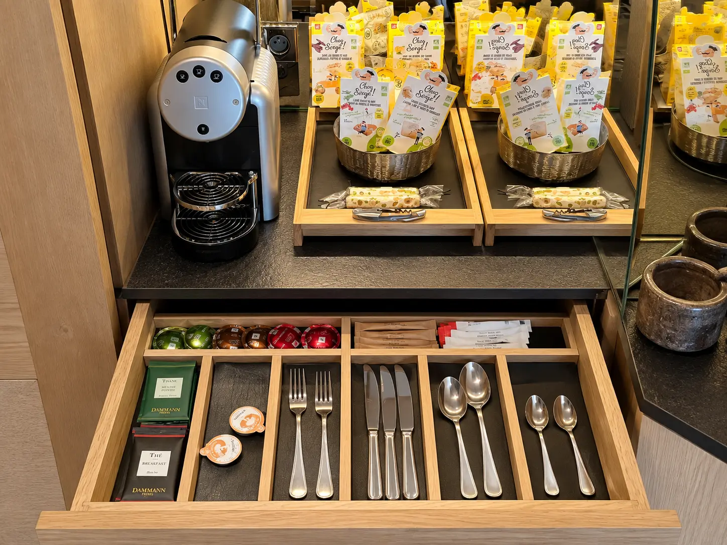 In-room Nespresso coffee machine, Dammann Frères tea and snacks at Aman Le Mélézin.