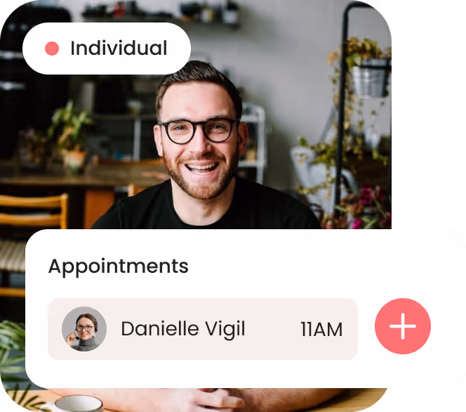 A man sitting at a table with two conversation bubbles above him.