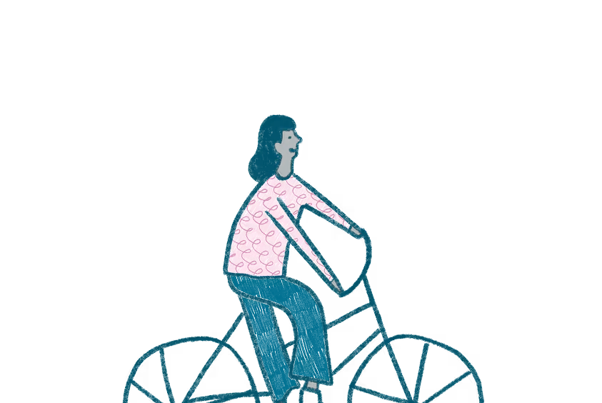 A person riding a bike on a black background.