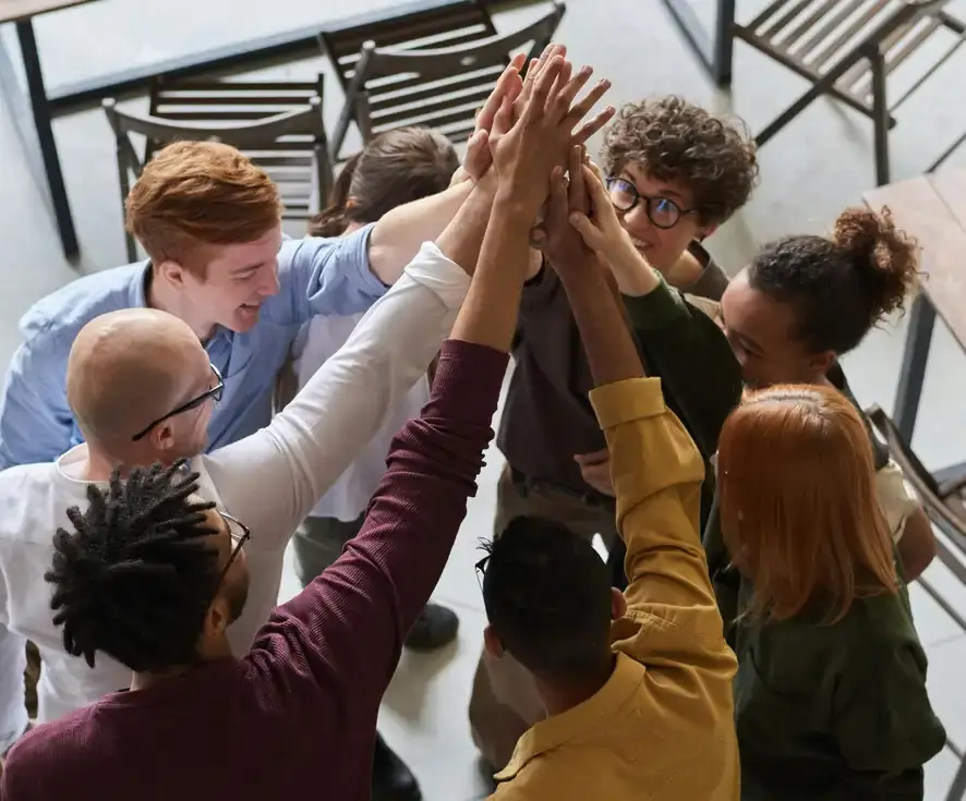 A team high fiving
