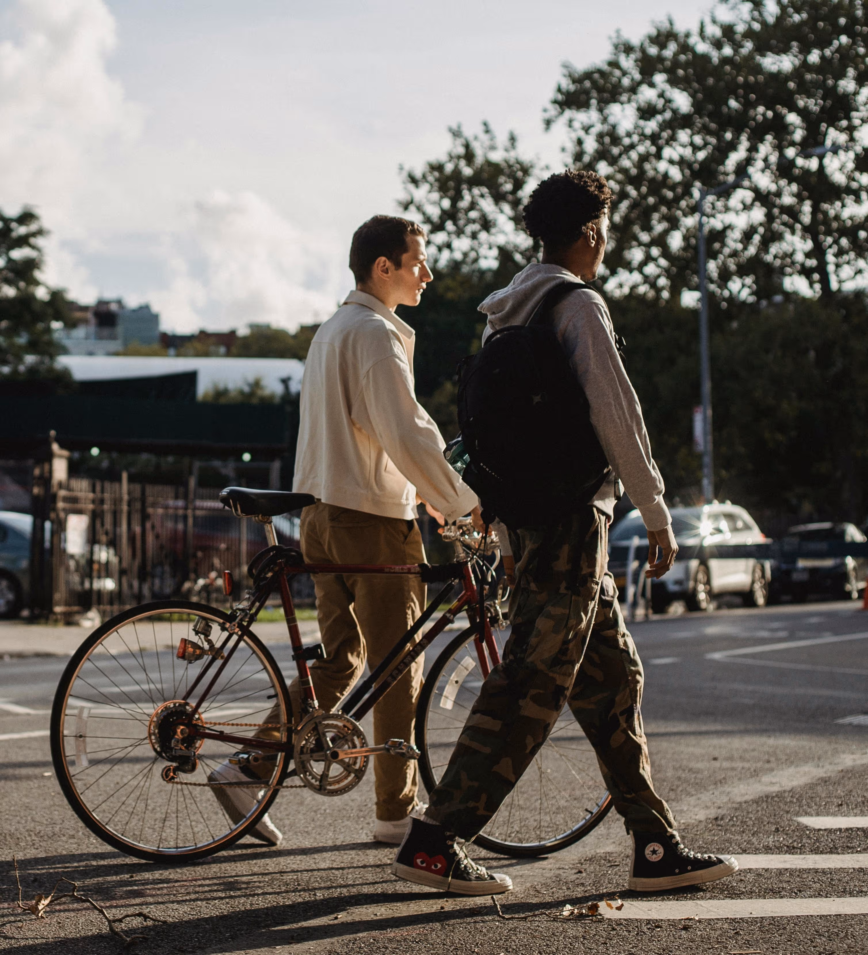 People walking with bikes stock image