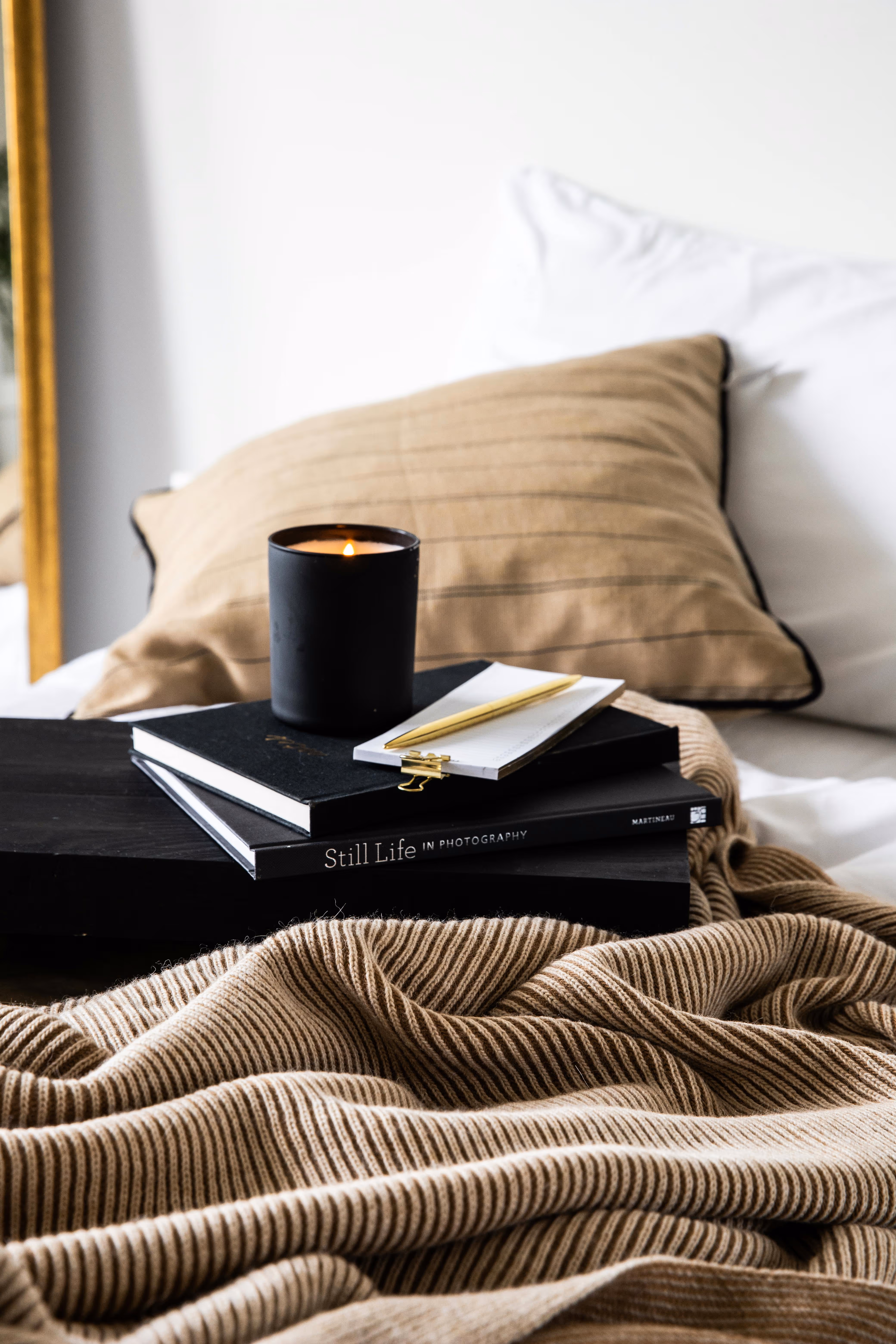 Candle on bed stock image