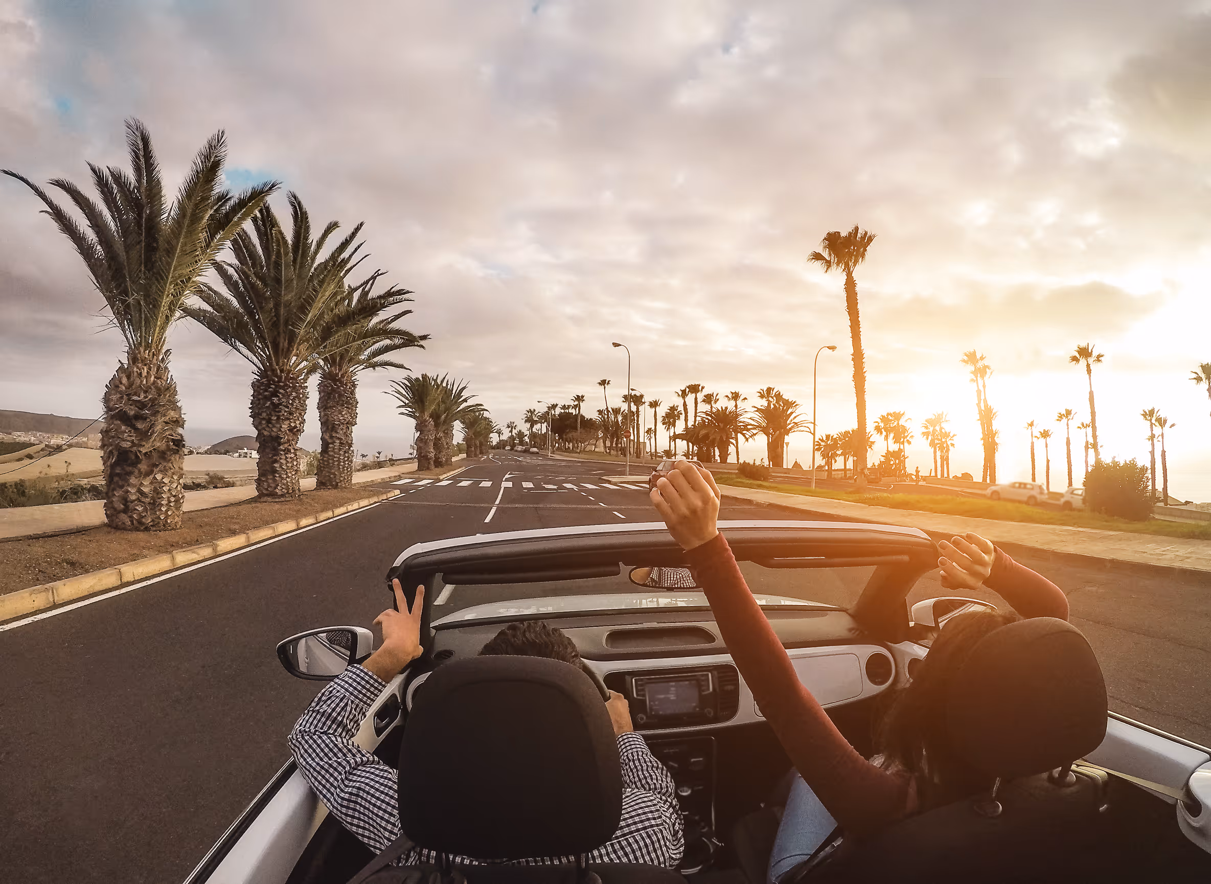 People driving in convertible s