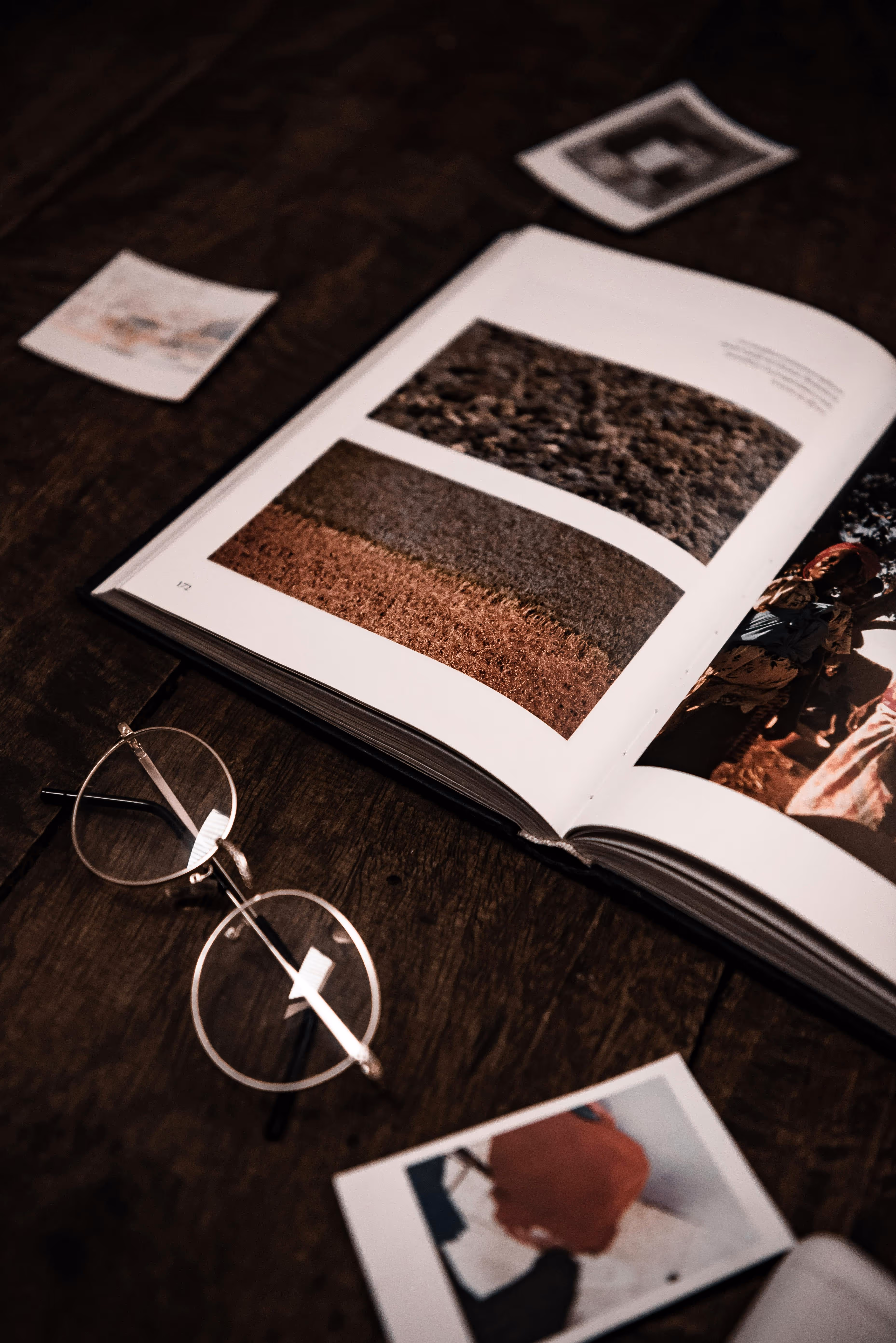 book and glasses on table stock image