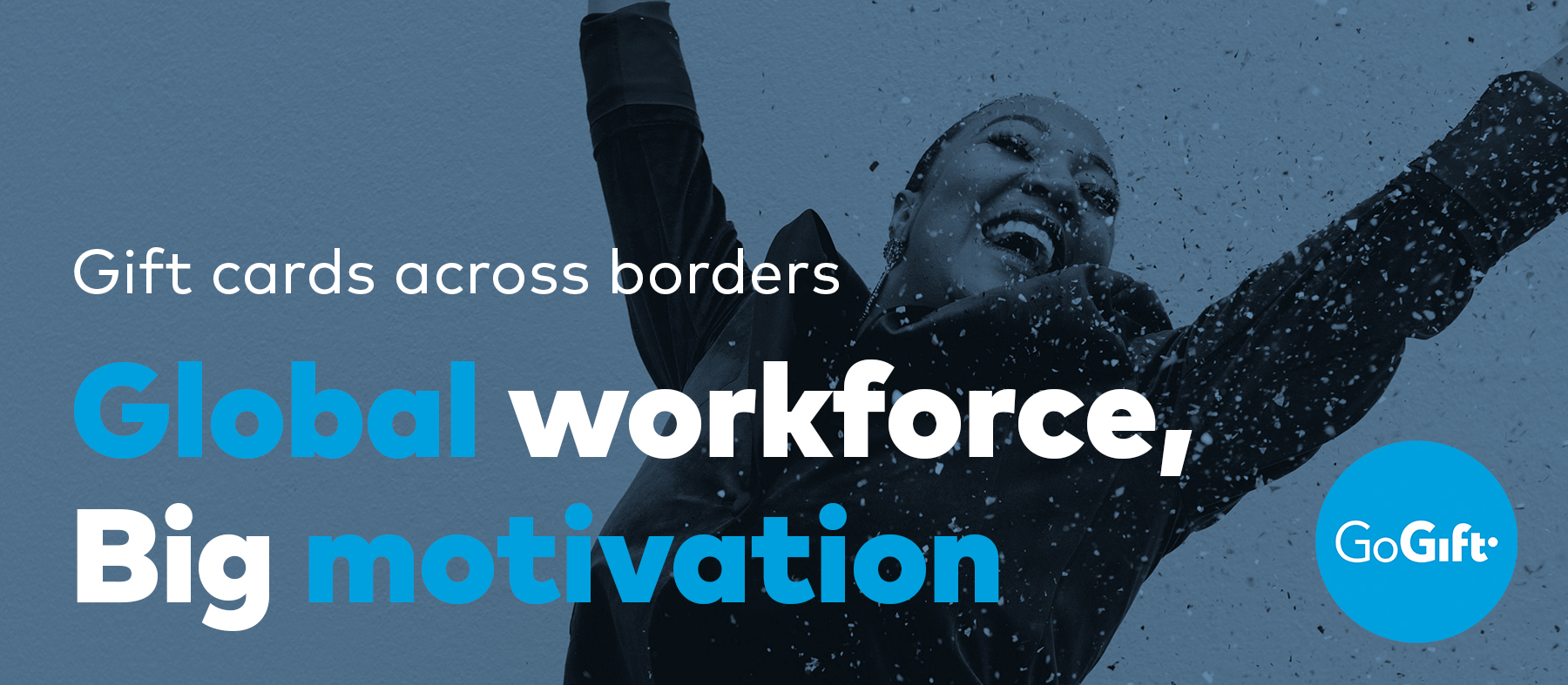 Blog banner reading "Gift cards across borders — Global workforce, Big motivation", showing a person celebrating outdoors
