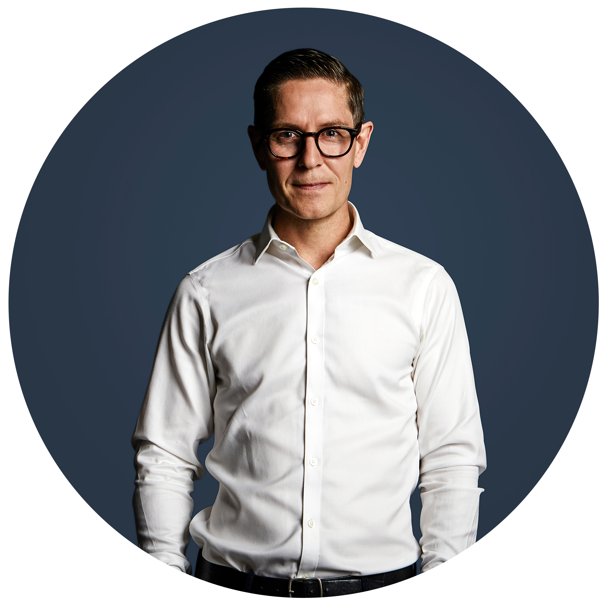 Portrait of a GoGift team member standing beside the GoGift logo