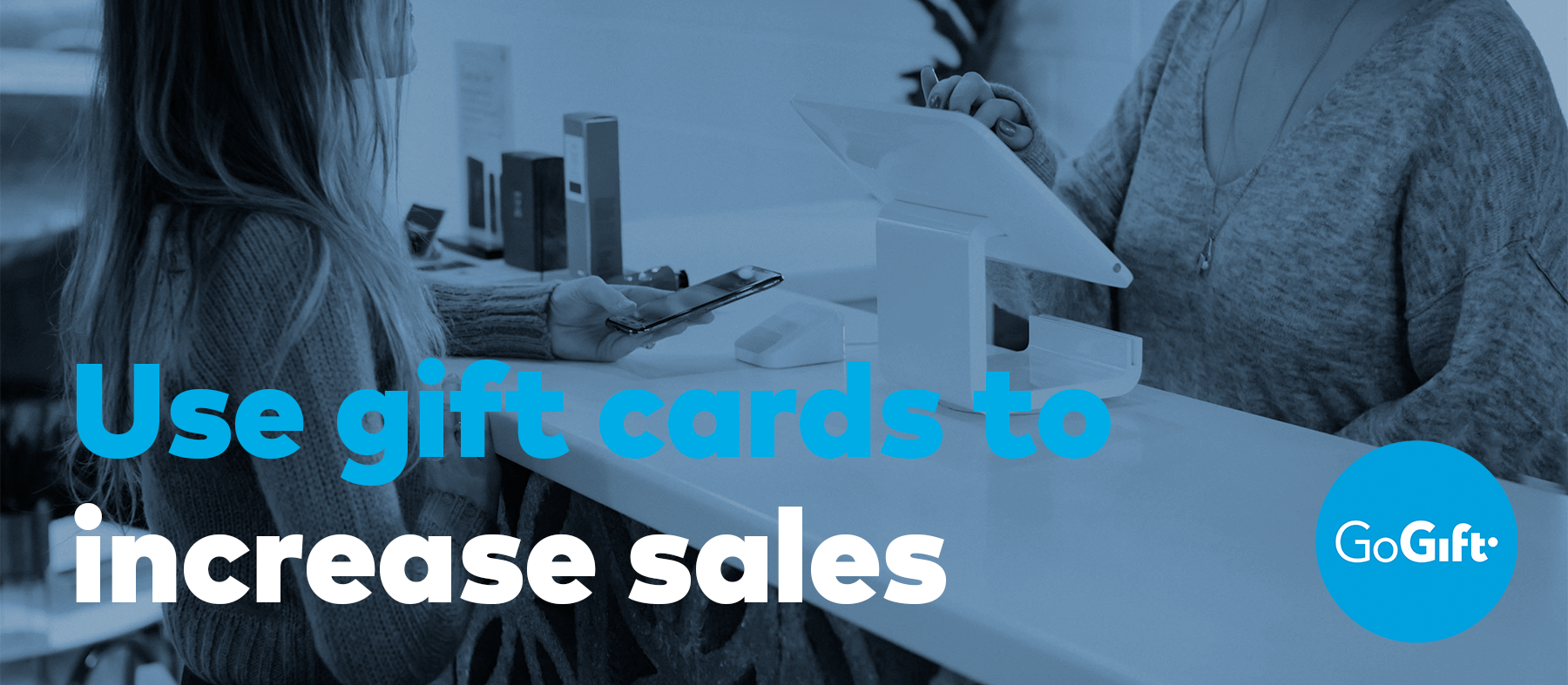 Blog banner reading "Use gift cards to increase sales", showing a retail checkout counter