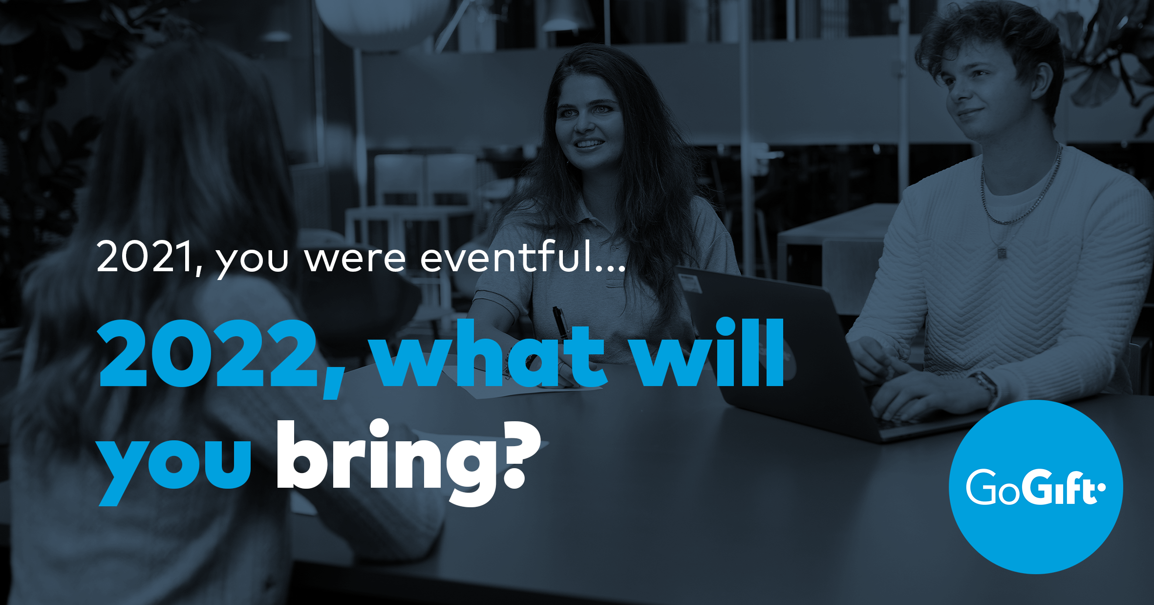 Blog banner reading "2021, you were eventful... 2022, what will you bring?" showing colleagues in a meeting