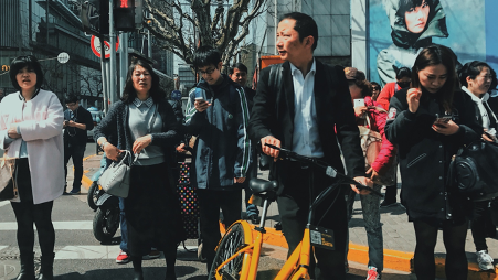 Group of people in China going about their daily lives