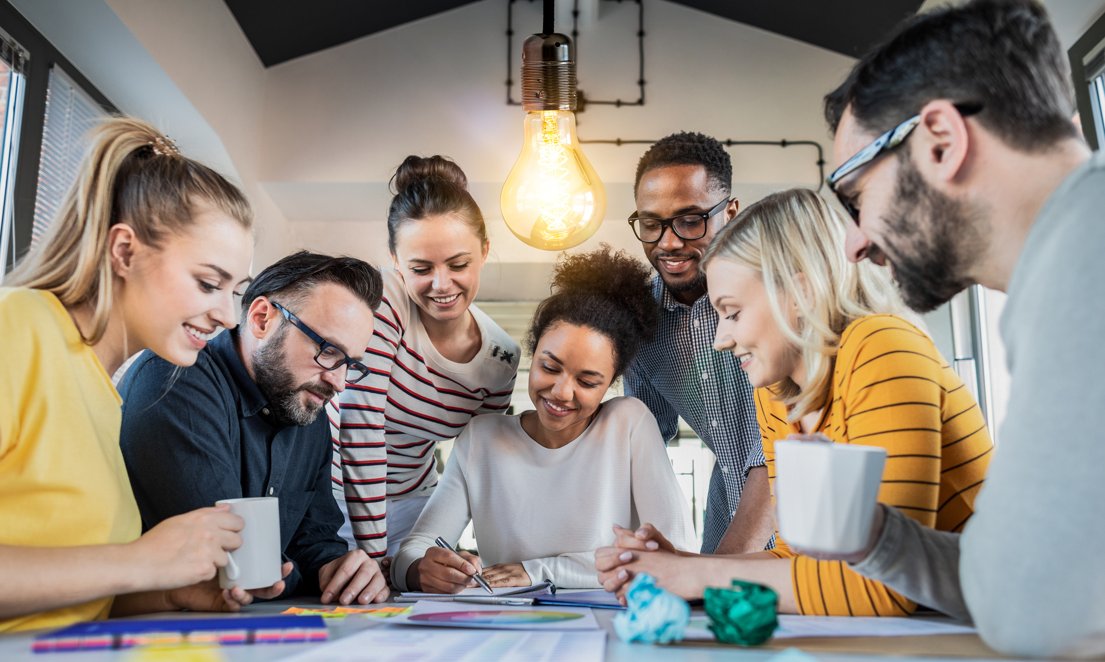 A team of happy employees celebrating success