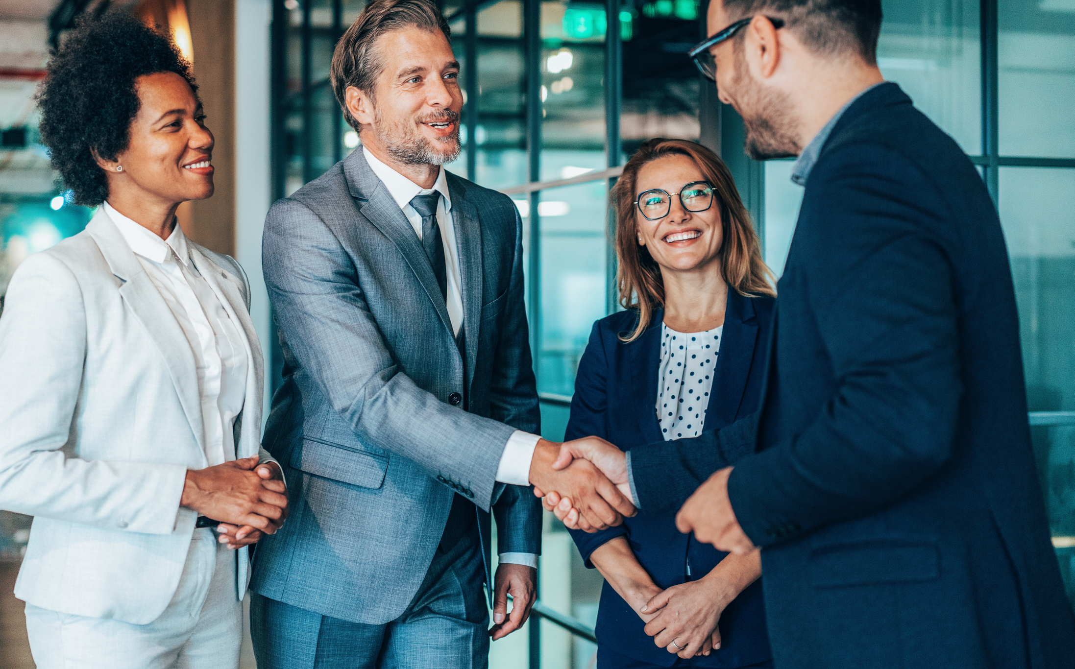 Business professionals shaking hands, symbolizing successful collaboration