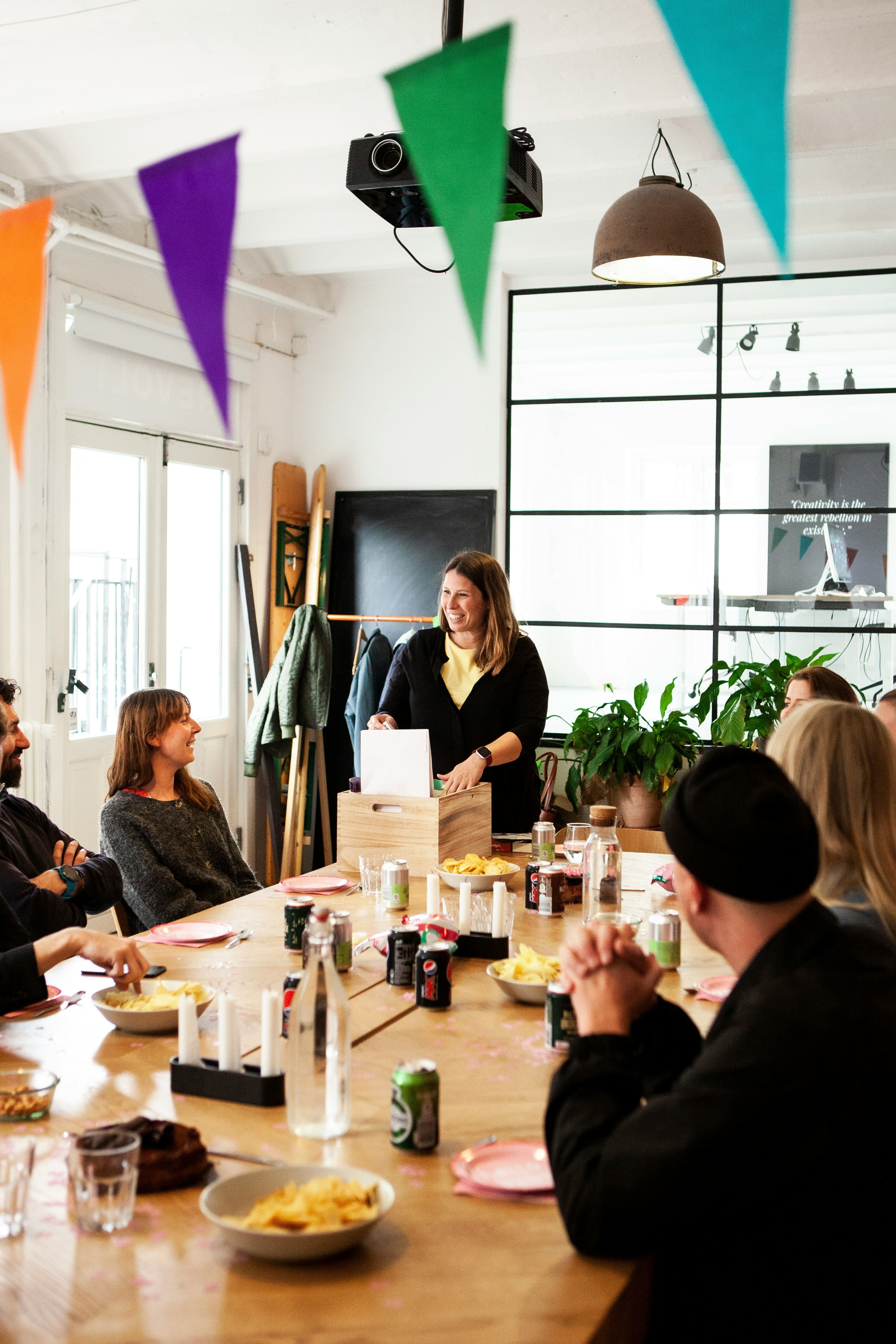 An office party with drinks and snacks