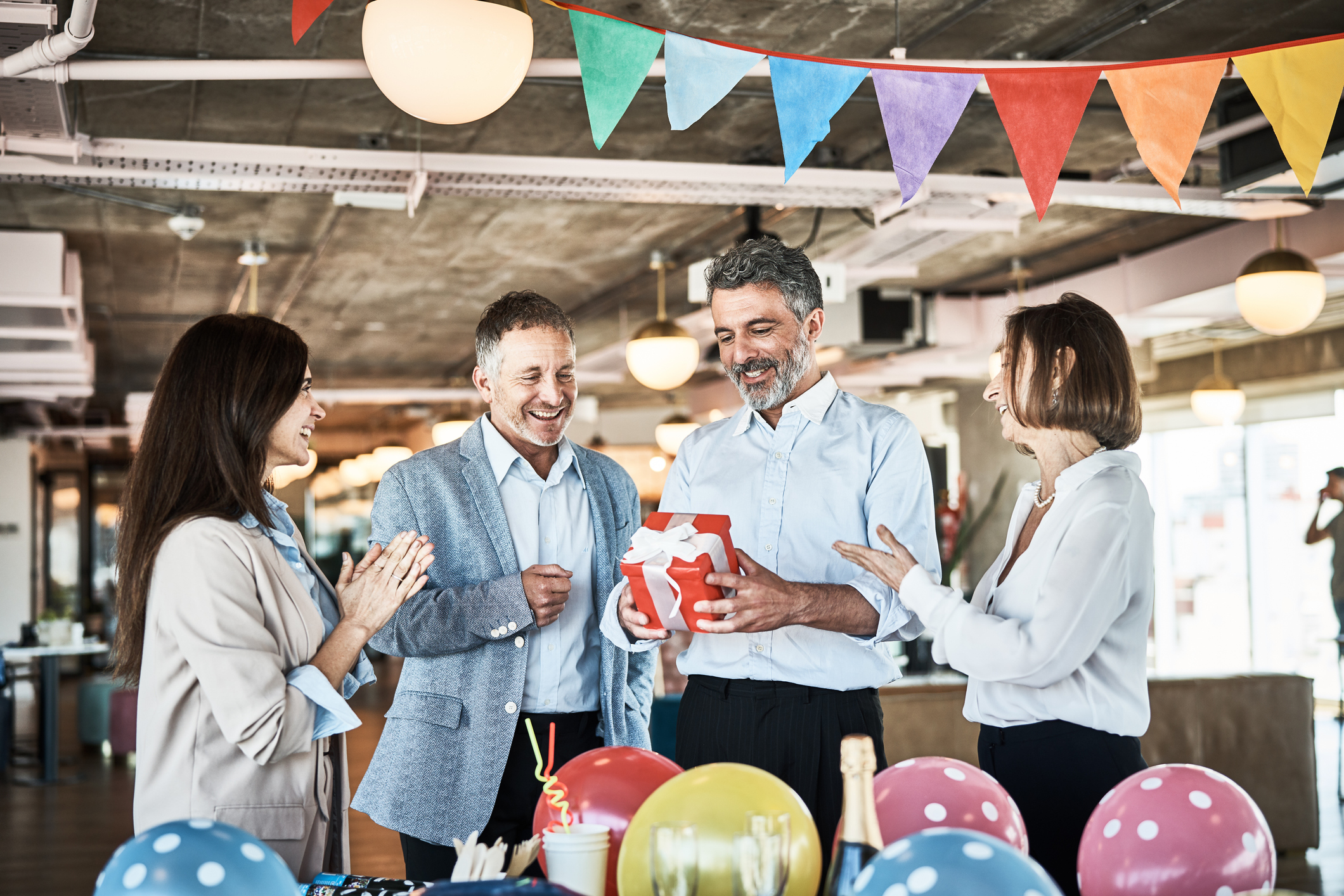 Employees celebrating in the workplace