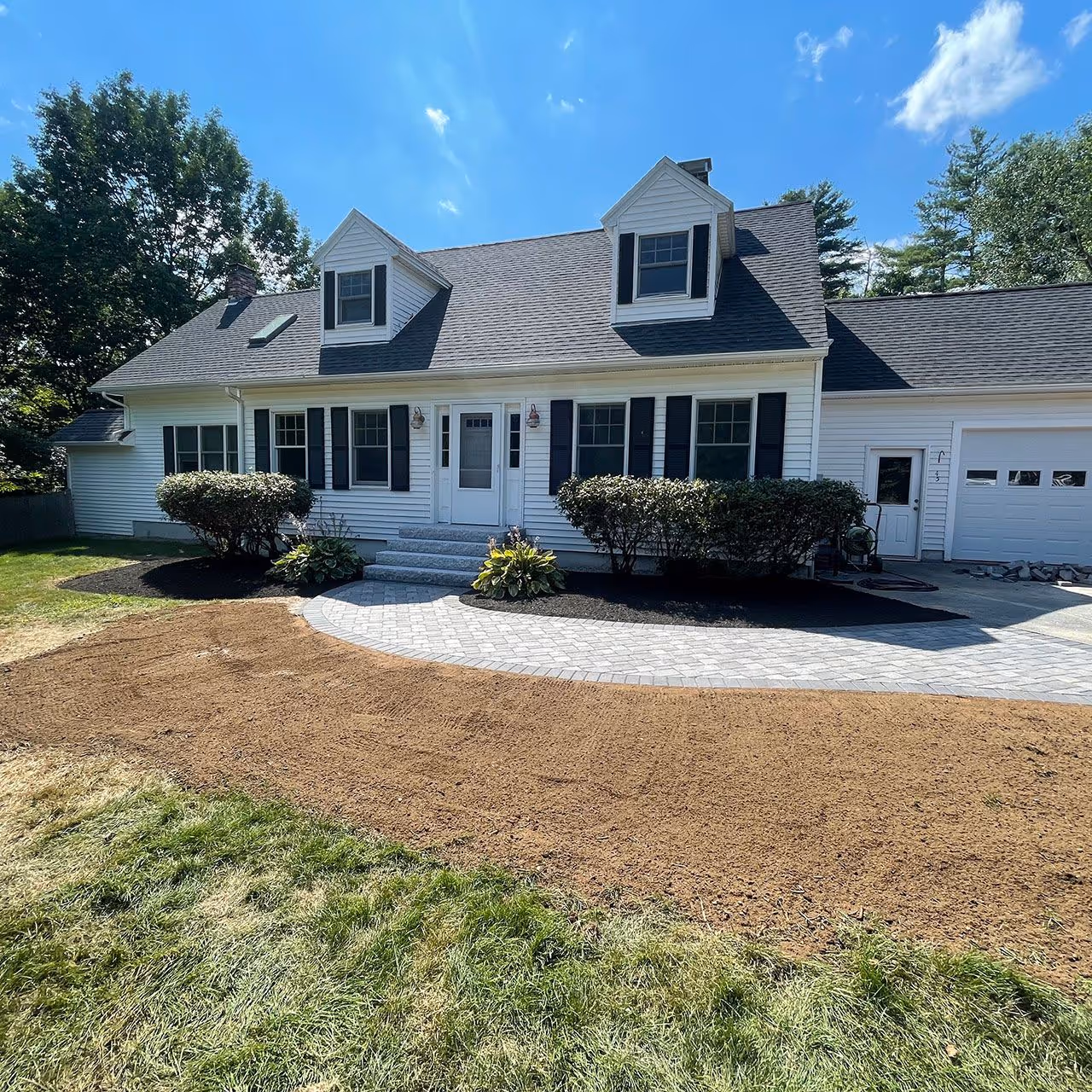 landscaping mulch installation residential property Maine