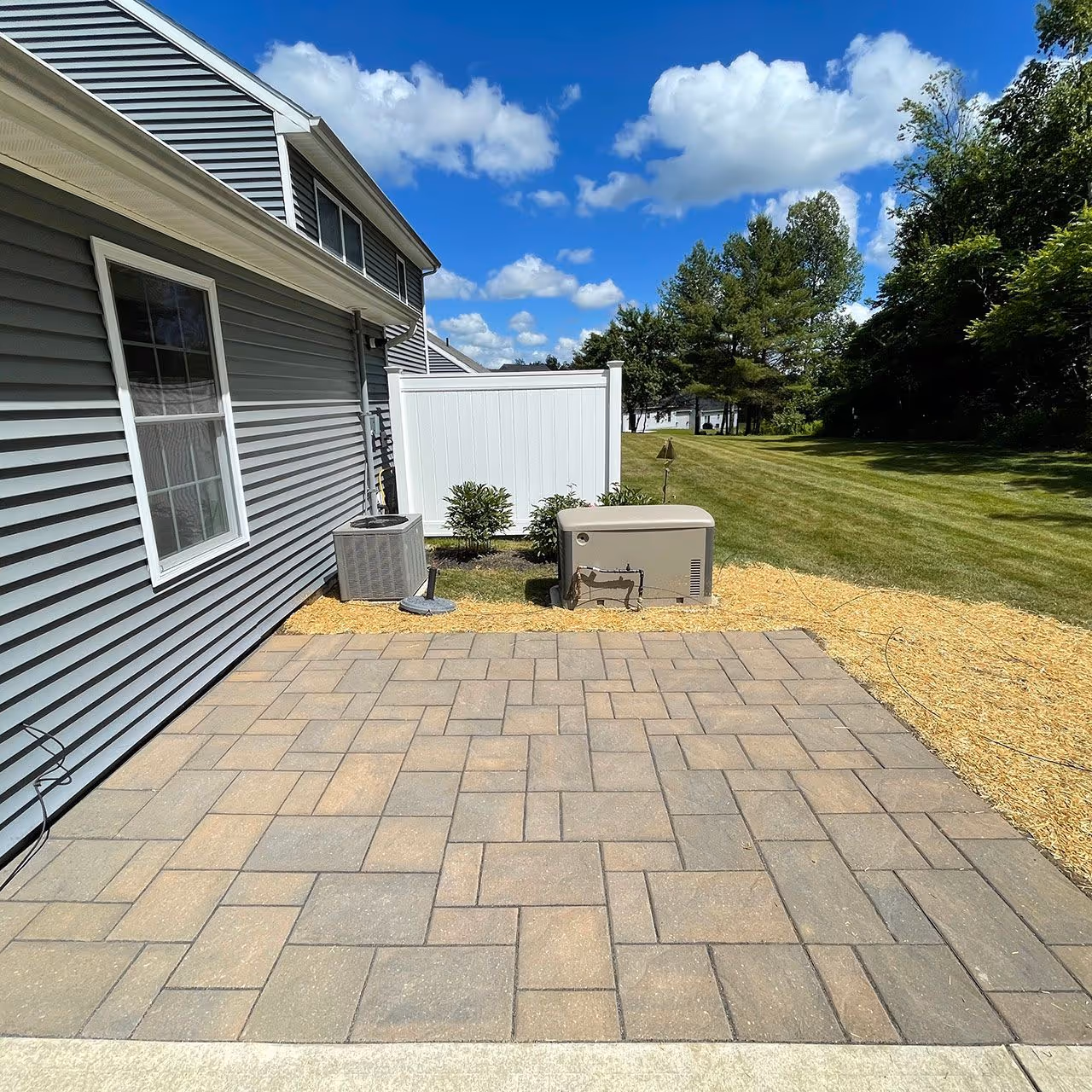backyard patio hardscape project near me Central Maine CamCo Lawn Care