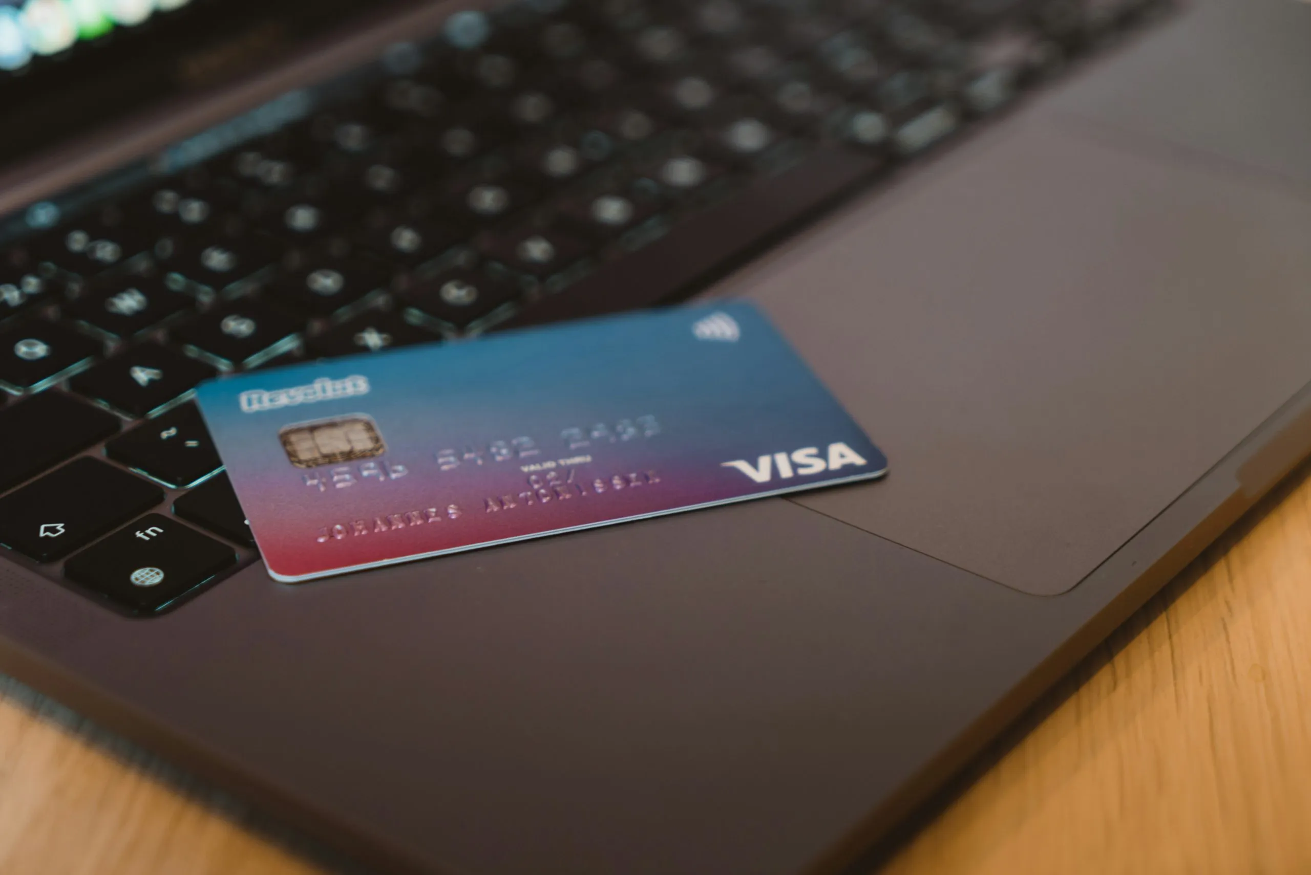 bank card on a laptop keyboard