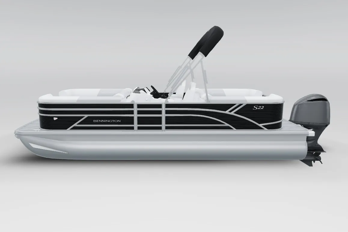 Side view of a black and silver Bennington S22 pontoon boat with a raised canopy and outboard motor.