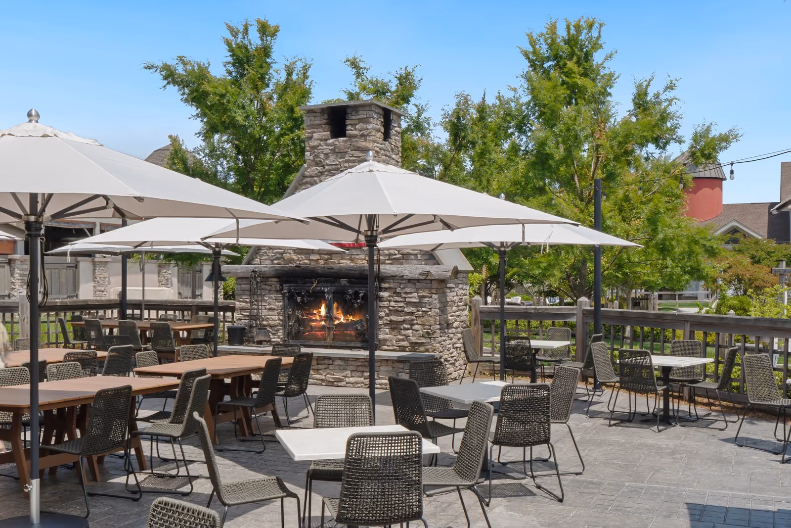 Outdoor terrace dining at Knoxie's with waterfront views at Chesapeake Bay Beach Club