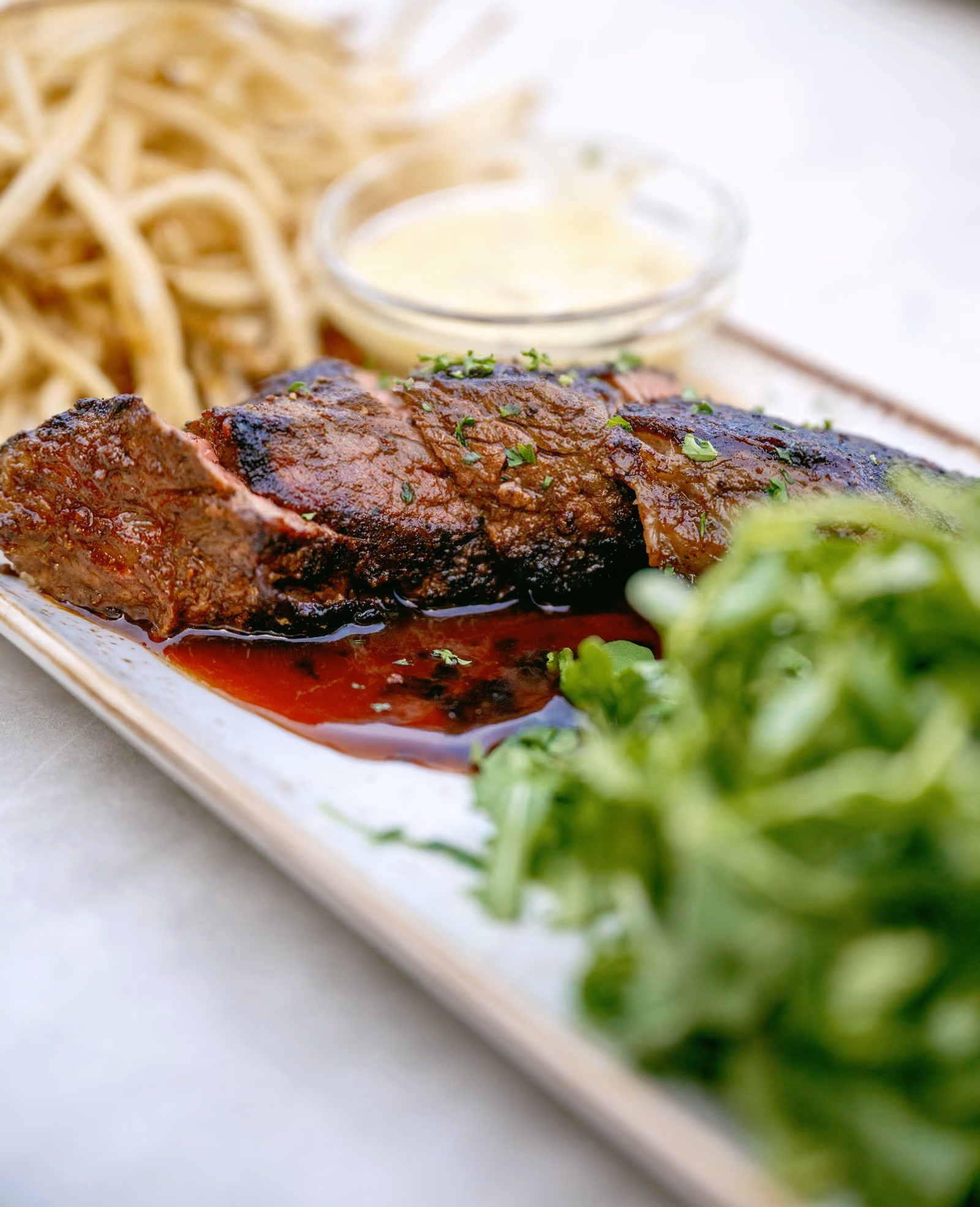 Steak frites dish served at Knoxie's restaurant, Chesapeake Bay Beach Club