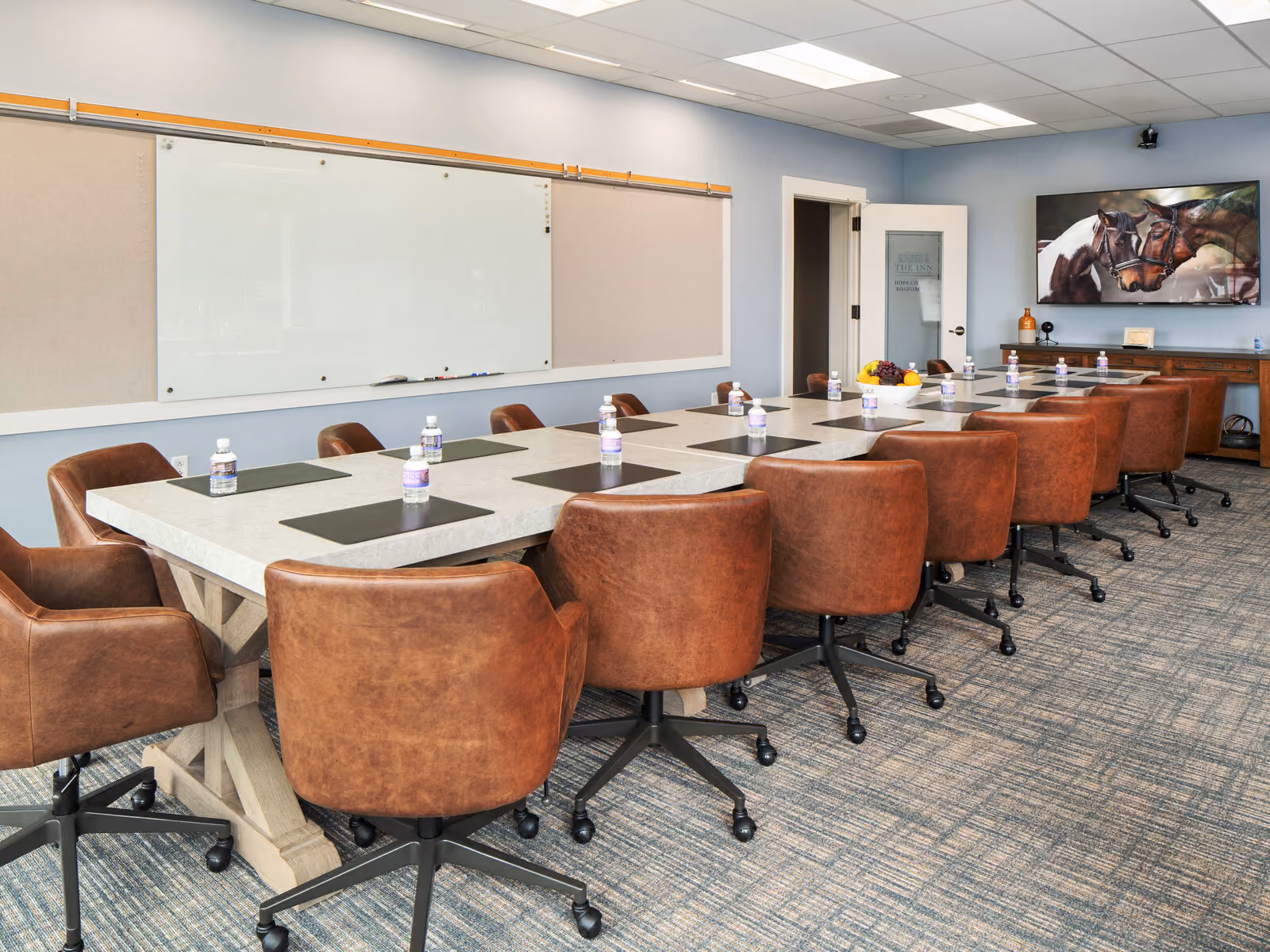 Hops Corner venue with whiteboard, pin board, and plasma screen for collaborative meetings at Chesapeake Bay Beach Club