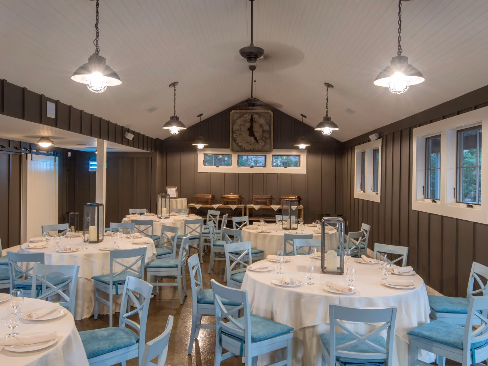 Tool Shed interior with elegant table settings and rustic decor for intimate gatherings at Chesapeake Bay Beach Club