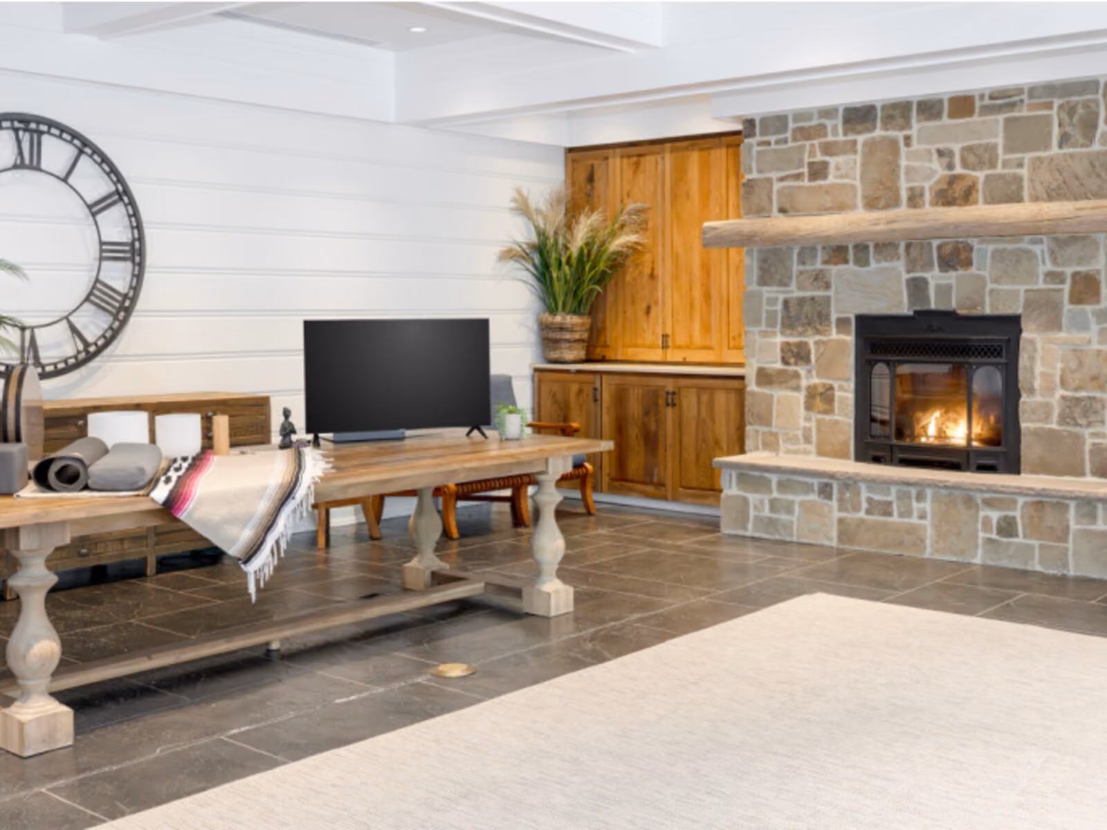 Breezeway private breakout area with French doors, stone fireplace, and lounge seating at Chesapeake Bay Beach Club