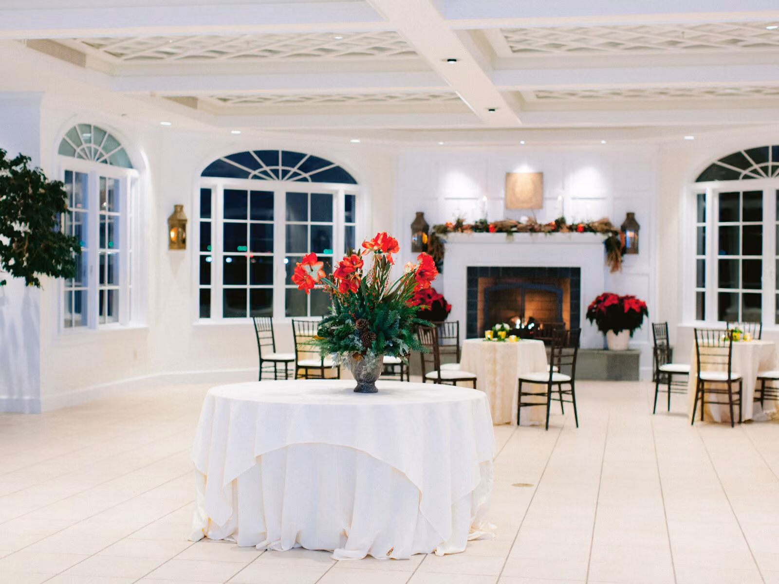 Garden Room with arched French doors, coffered latticed ceiling, and intimate dining setup at Chesapeake Bay Beach Club