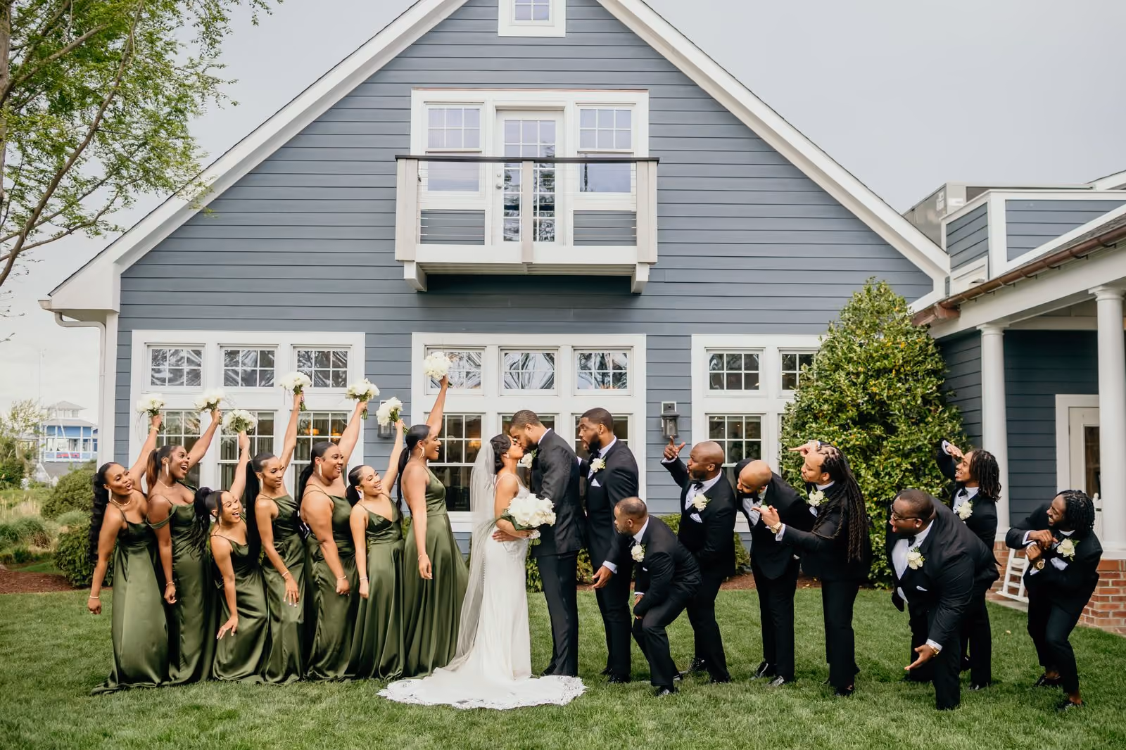 Guests at a sunset rooftop wedding at Chesapeake Bay Beach Club