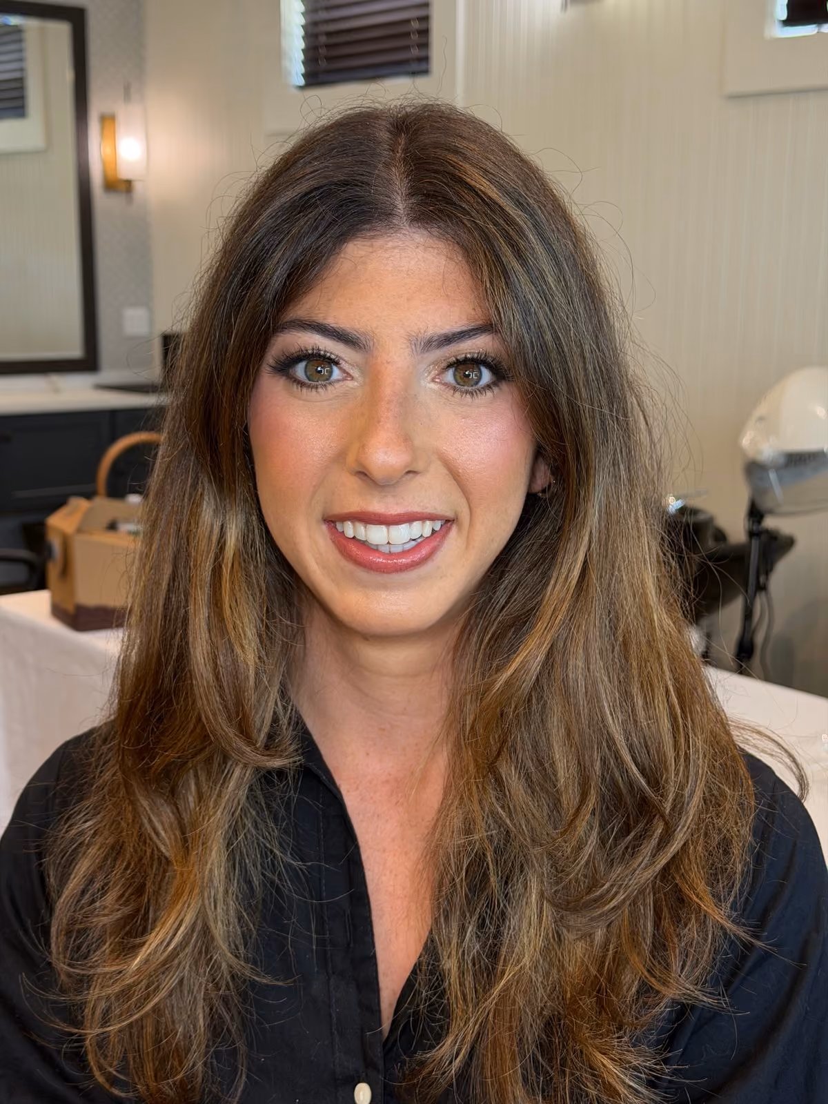 Glam bridal makeup with long wavy hair at Chesapeake Bay Beach Club
