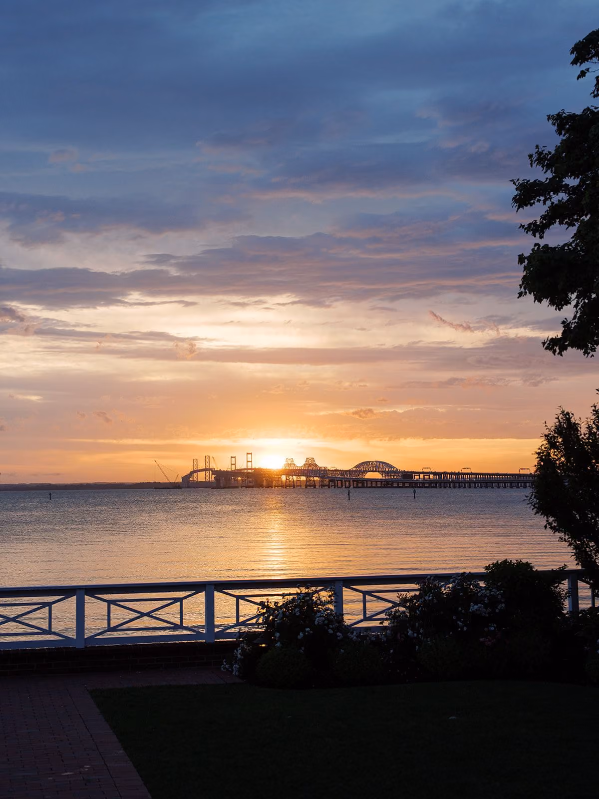 Sunset over the Chesapeake Bay and Bay Bridge from the Beach House terrace at Chesapeake Bay Beach Club