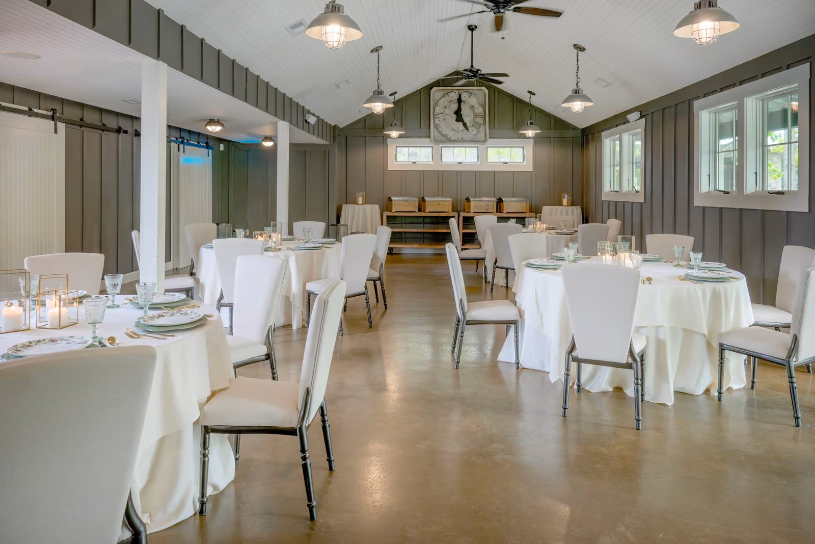 Tool Shed Bar with long banquet tables under a vaulted ceiling at The Inn at Chesapeake Bay Beach Club