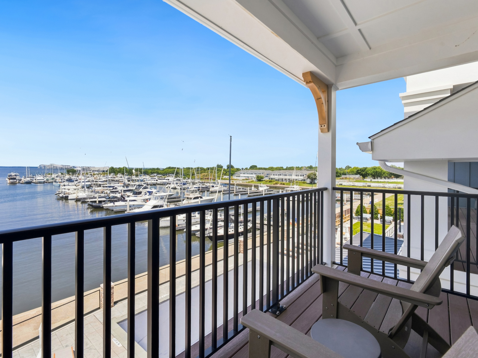 Private balcony at Wilson’s Cove overlooking Bay Bridge Marina and the Chesapeake Bay.