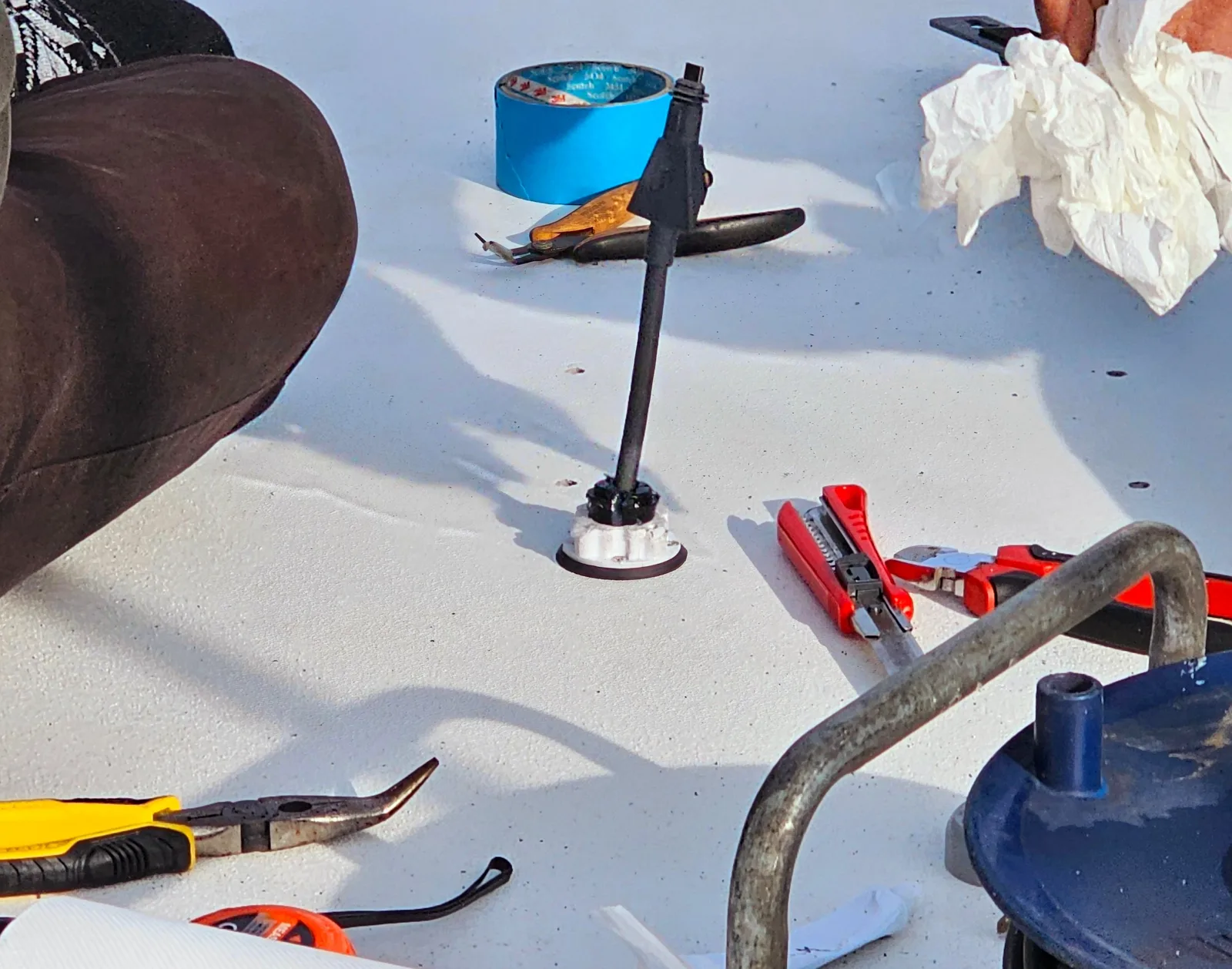 Watertight cable gland being fitted during a Starlink installation on a yacht