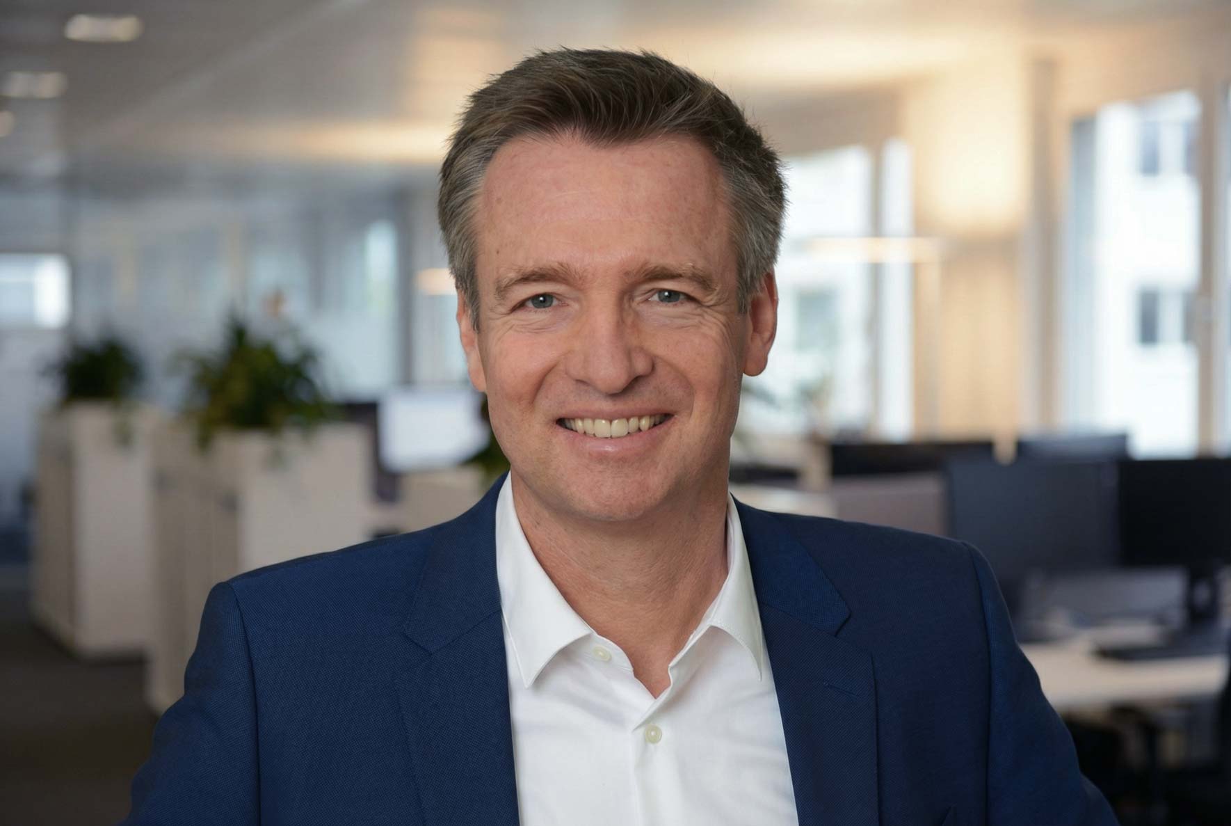Dr. Andreas Hartung, der Gründer von H2A - Hartung Healthcare Advisory lächelt in die Kamera