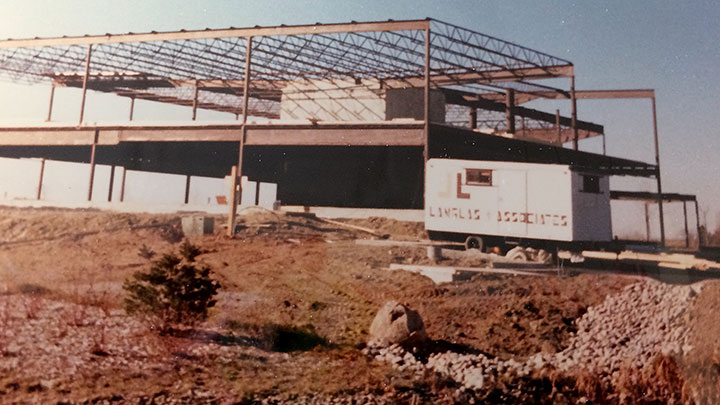 Early Langlas construction project with steel framing in progress, circa 1983