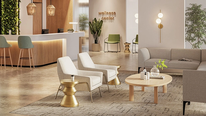 Reception area seating with lounge chairs, sofa, and coffee table in a modern office waiting space