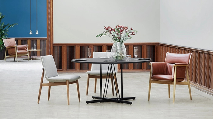 Office café table with chairs in a breakroom setting designed for casual meetings and collaboration
