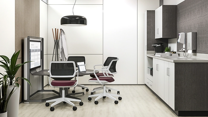 Modern office with modular workstation system, ergonomic chairs, and integrated storage in a clean professional workspace