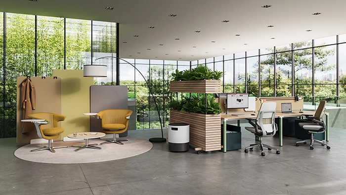 Open office with acoustic panels, lounge seating, and workstations designed for collaboration and focused work