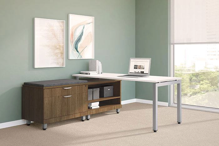 Lateral filing cabinet with wide drawers for document storage in a modern office environment