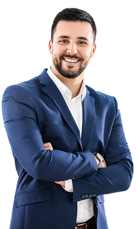 Smiling young man with beard wearing a navy blue suit and white shirt, arms crossed.
