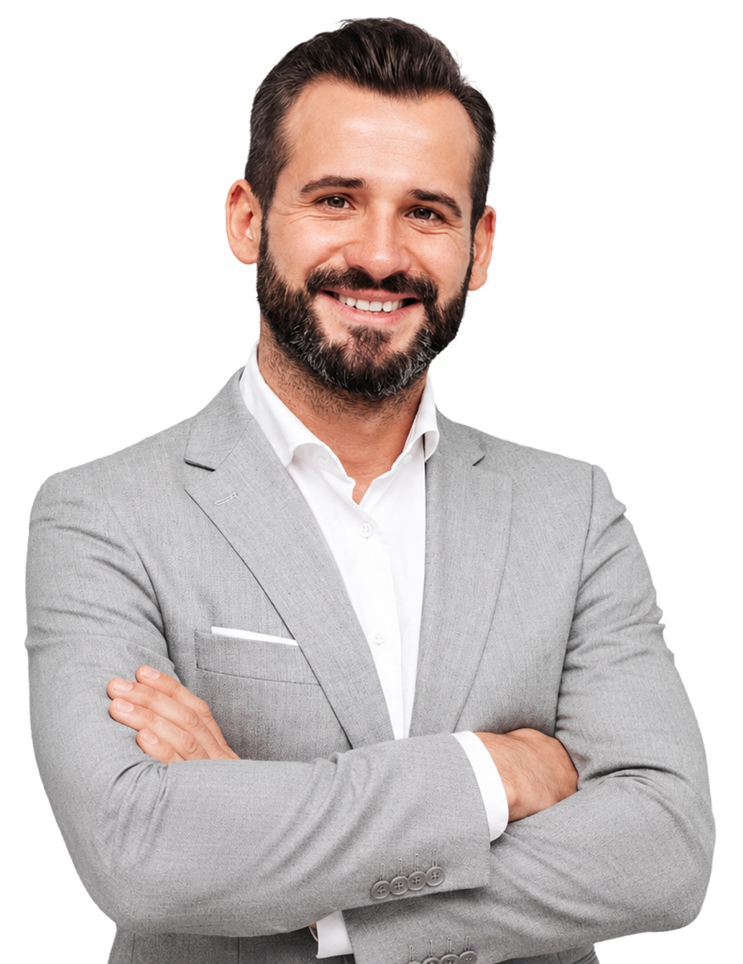 Smiling man with beard wearing light gray suit and white shirt with arms crossed.