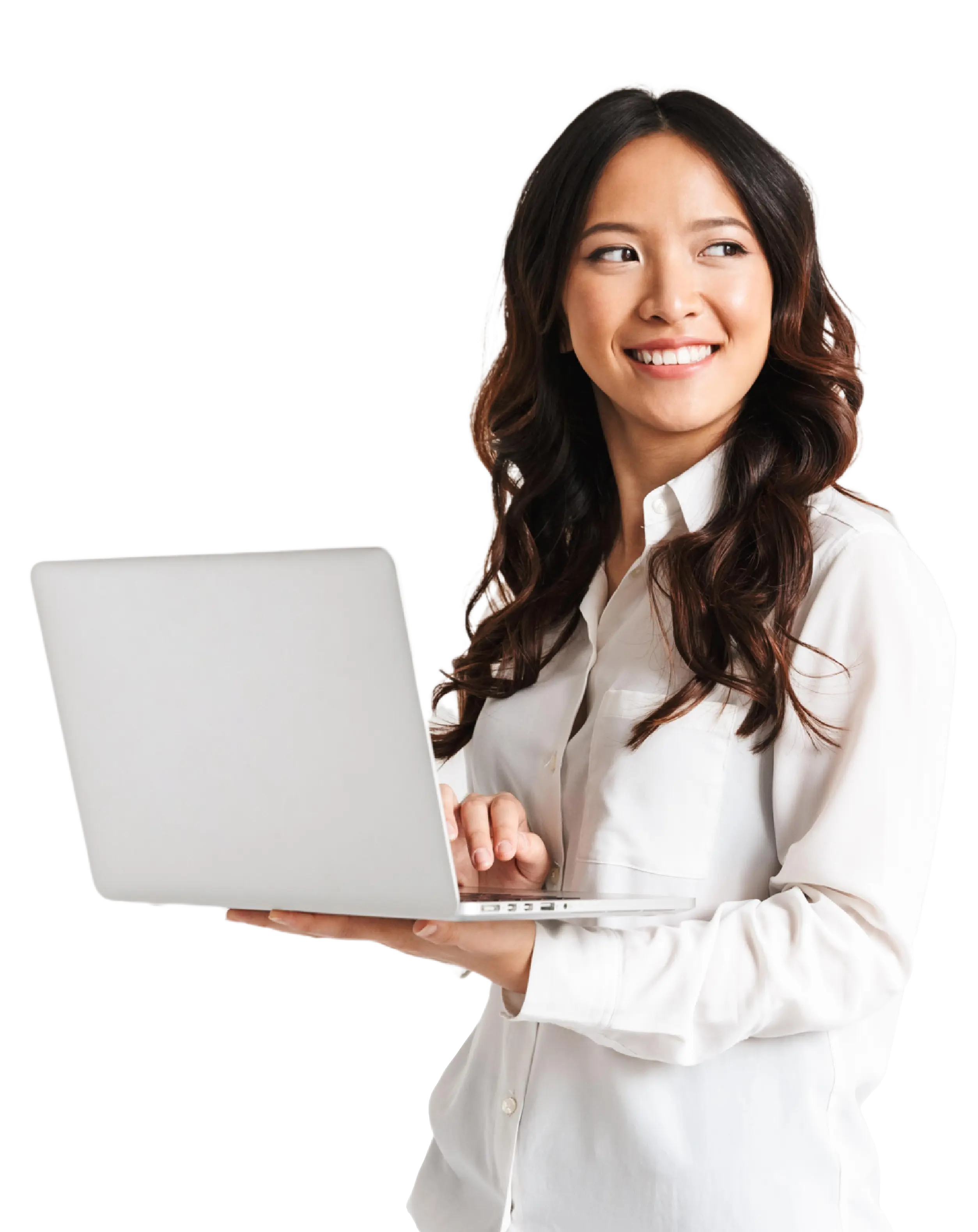 Smiling woman in white shirt holding and using a silver laptop looking to the side.