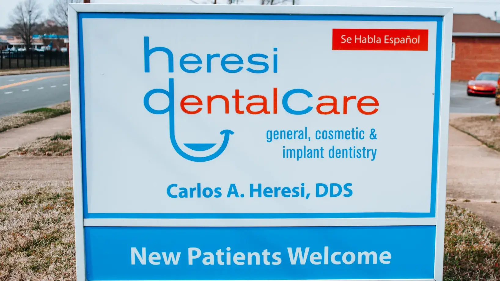 A sign for a new dentist's welcome center.