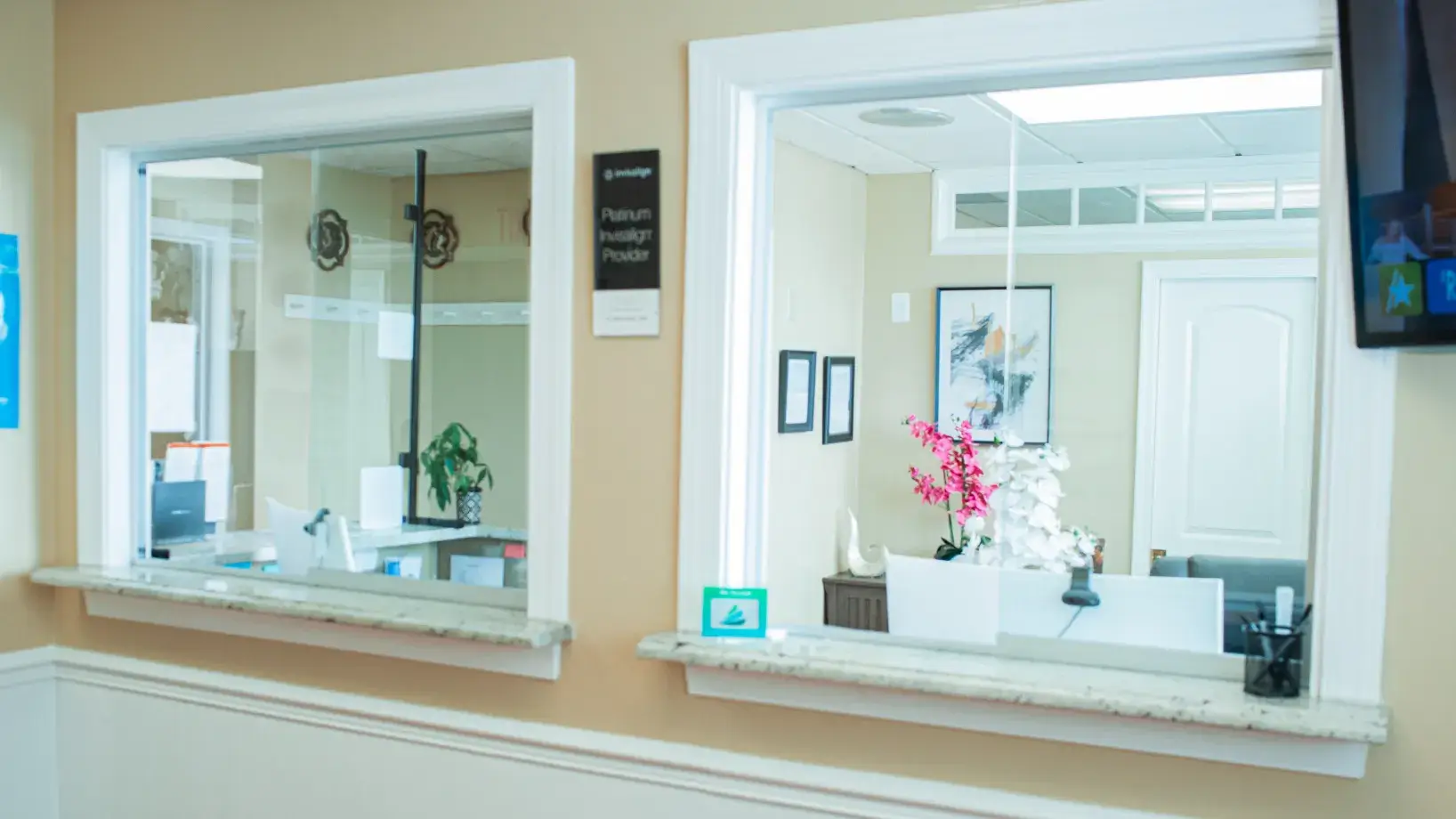 A bathroom with a sink and a mirror on the wall.