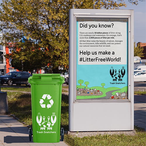 A billboard ad featuring a branded recycling bin next to the billboard.