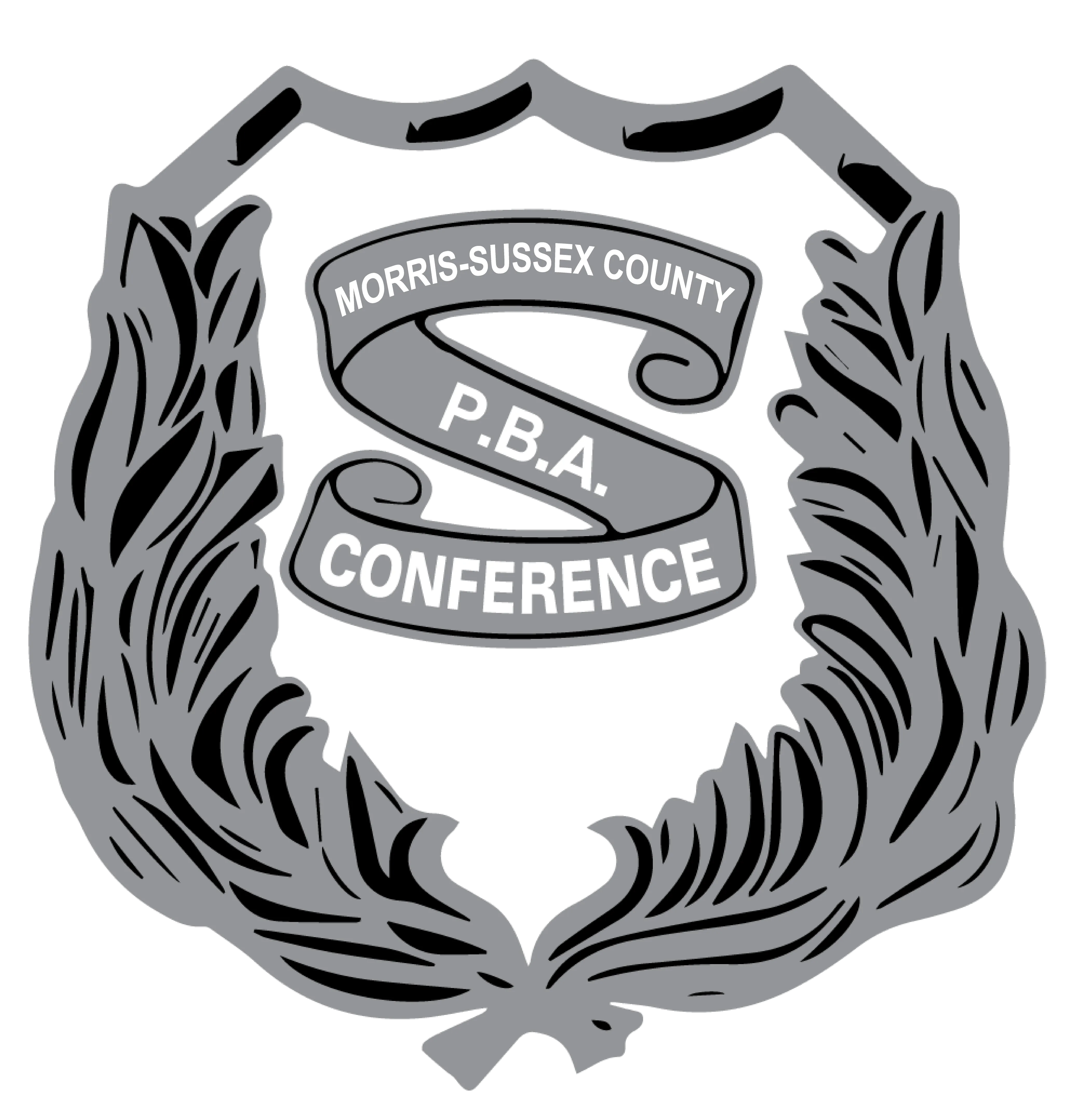 Badge-style emblem with a ribbon reading 'Morris-Sussex County P.B.A. Conference' surrounded by ornate leaf designs.