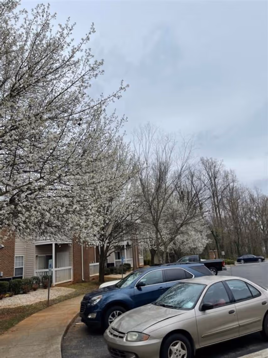 Exterior apartment community with landscaping