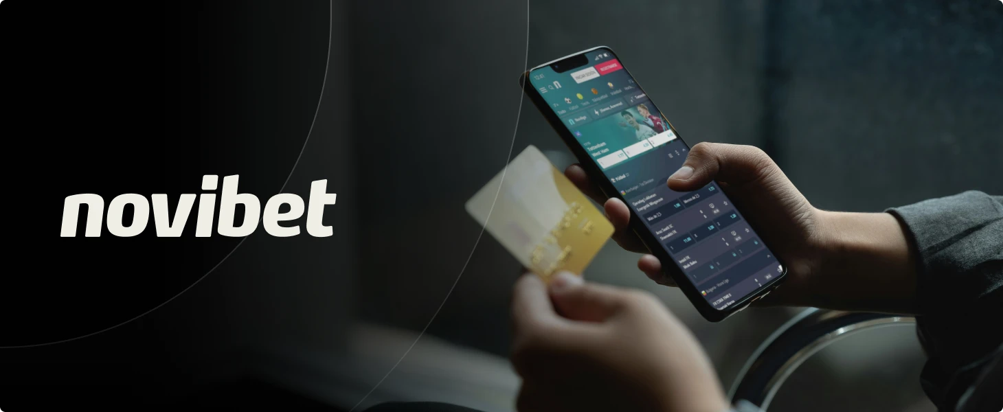 Person holding a smartphone displaying a betting app and a credit card in the other hand, with the Novibet logo on the left.